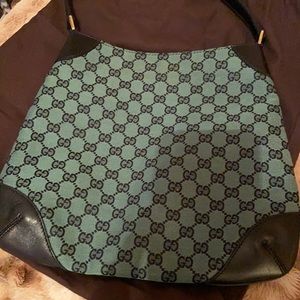 Teal and black handbag